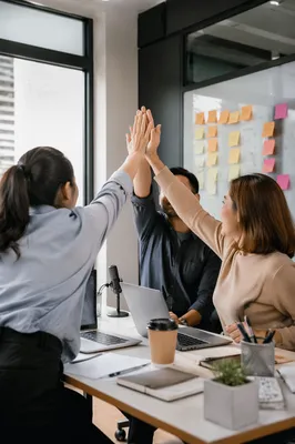 Startup Team High Five in Modern Office