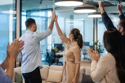 Diverse Office Team Celebrating Success