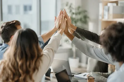 Modern Office Team Celebrating High Five