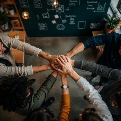 Diverse Business Team Hands in Unity