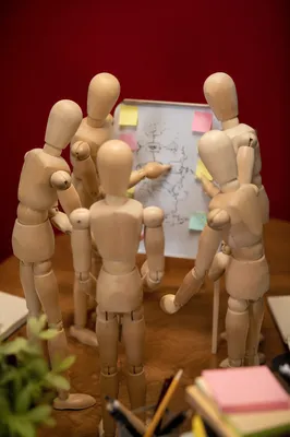 Team Brainstorming Around Whiteboard Ideas