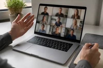 Remote Video Conference Meeting on Laptop Desk
