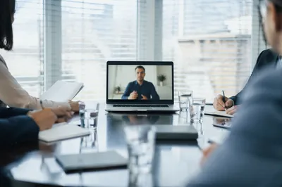 Modern Video Conference Meeting in Bright Office