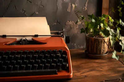 Vintage Typewriter Workspace with Ivy Plant