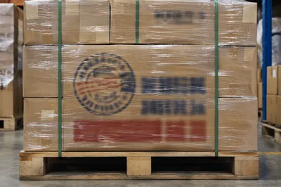 Wrapped Shipping Boxes on Warehouse Pallet