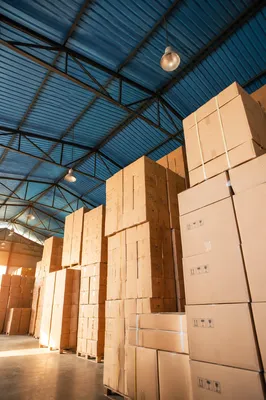 Warehouse Logistics with Stacked Shipping Boxes