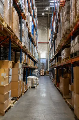 Warehouse Aisle with Shipping Boxes