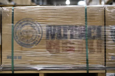 Wrapped Shipping Boxes on Warehouse Pallet