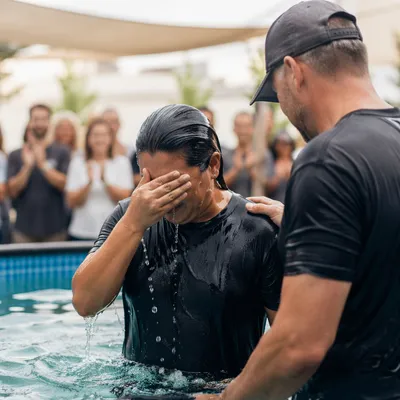 Adult Baptism in Community Church Courtyard