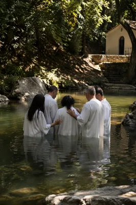 Adult Baptism in Peaceful River Pool