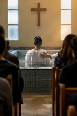 Reverent Adult Baptism in Church Pool