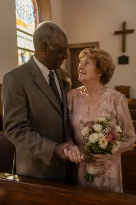 Elderly Couple Celebrating Anniversary in Church