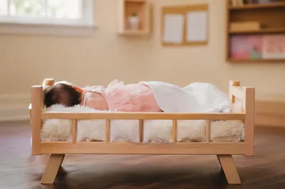 Peaceful Infant Resting in Church Nursery Crib