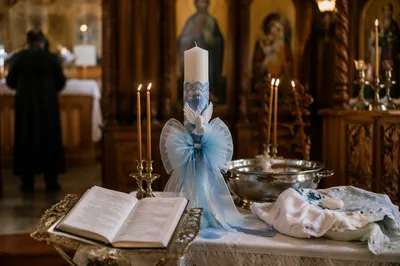 Baptism Candle with White Dove in Church