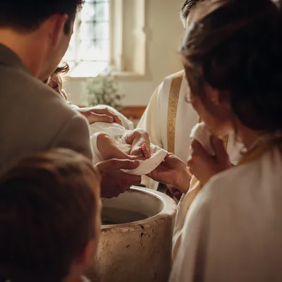 Tender Baptism Family Moment in Church
