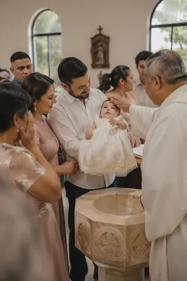 Joyful Family Baptism in Tender Church Setting