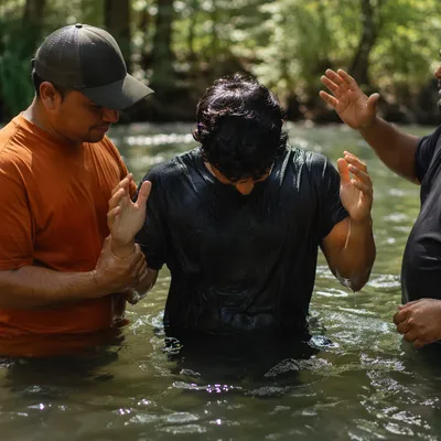 Outdoor River Baptism in Wooded Stream