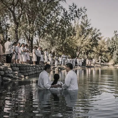 Reverent Outdoor River Baptism Gathering
