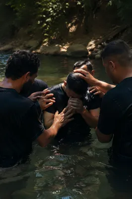 Outdoor River Baptism in Wooded Stream
