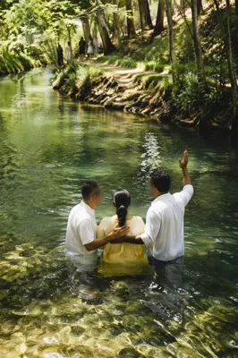 Outdoor River Baptism in Woodland Stream