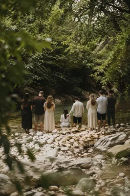 Reverent Outdoor River Baptism in Woodland Creek