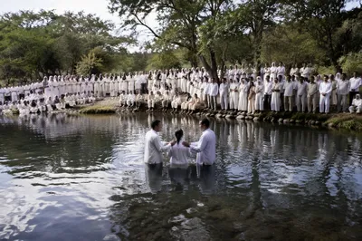 Outdoor River Baptism in Rural Church Gathering
