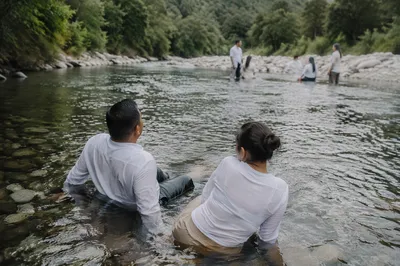 Reverent Outdoor River Baptism Ceremony