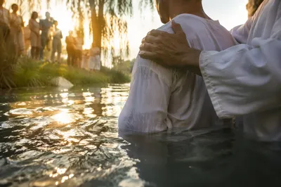 Peaceful Outdoor River Baptism at Sunrise