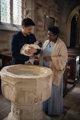 Stone Church Baptismal Font with Family