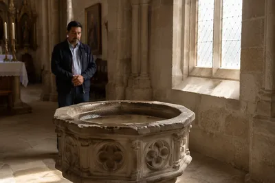 Stone Baptismal Font in Traditional Church