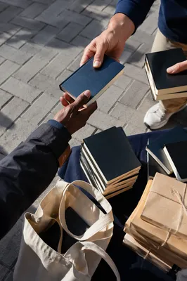 Church Volunteers Distributing Pocket Bibles