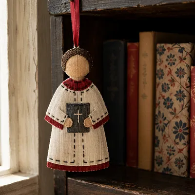 Handmade Choir Robe Ornament on Bookshelf
