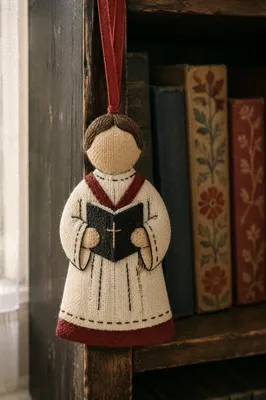 Handmade Choir Robe Ornament on Bookshelf