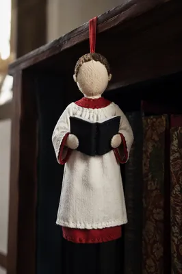 Handmade Choir Robe Ornament on Church Shelf