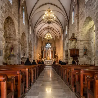 Historic Church Aisle Toward Glowing Altar
