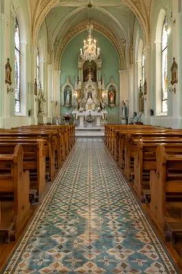 Historic Church Aisle Toward Ornate Altar