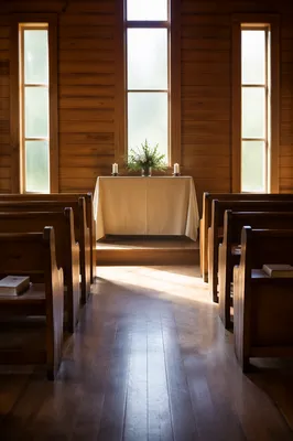 Sunlit Chapel Aisle Leading to Simple Altar