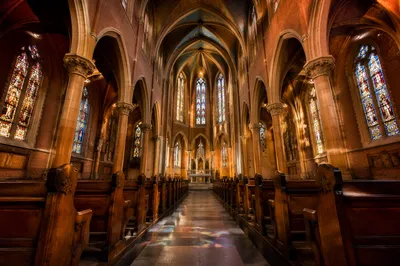 Grand Church Aisle Toward Ornate Altar