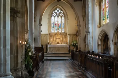 Historic Church Aisle Toward White Altar