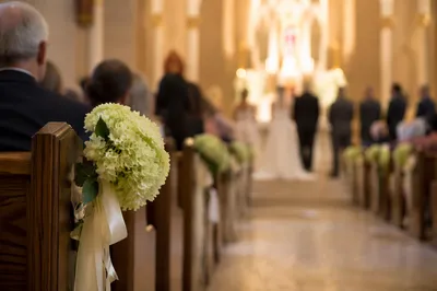 Wedding Church Aisle Toward Glowing Altar