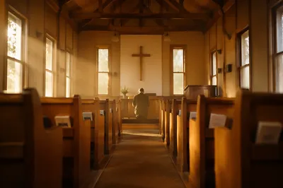 Morning Chapel Aisle Toward Wooden Cross