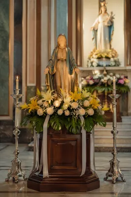 Serene Church Altar with Flowers and Candles