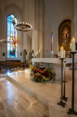 Church Altar Flowers and Candlelit Sanctuary