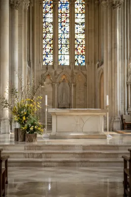 Serene Church Altar with Flowers and Candles