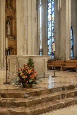 Church Altar Flowers and Candlelit Sanctuary