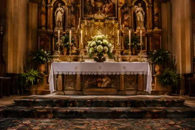 Historic Church Altar with Flowers and Candles