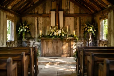 Rustic Chapel Altar with Flowers and Candles