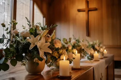 Quiet Church Altar with Flowers and Candles