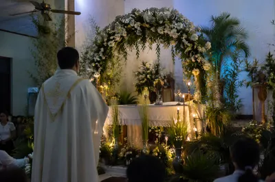 Church Altar with Flowers and Candlelight