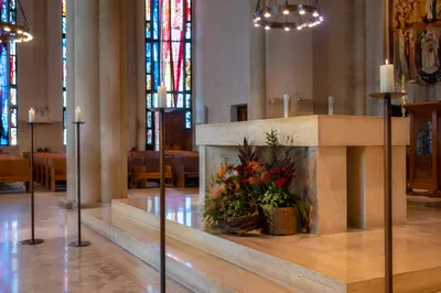 Church Altar Flowers and Candlelit Sanctuary